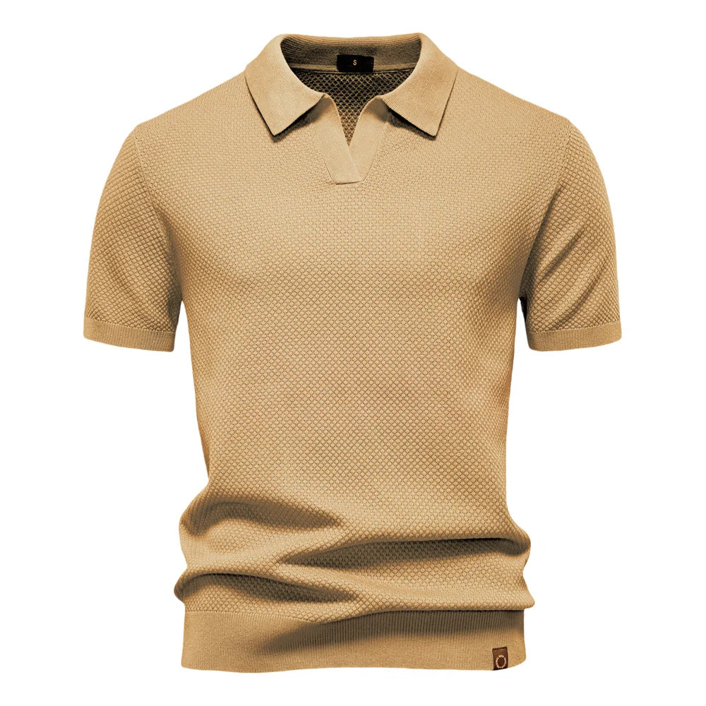 Men’s polo shirt with a structured collar, short sleeves, and tailored fit, ideal for summer days, casual outings, and smart-casual wear.