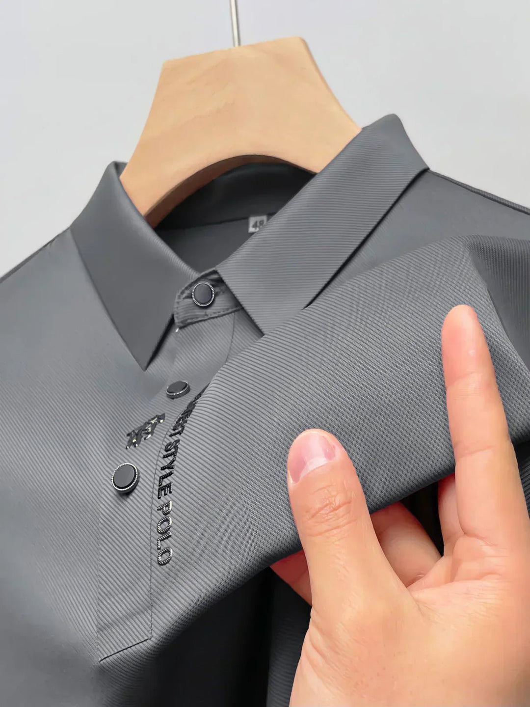 Men’s polo shirt with a stretch fit, classic collar, and short sleeves, ideal for office wear, weekend outings, casual gatherings, and everyday styling.