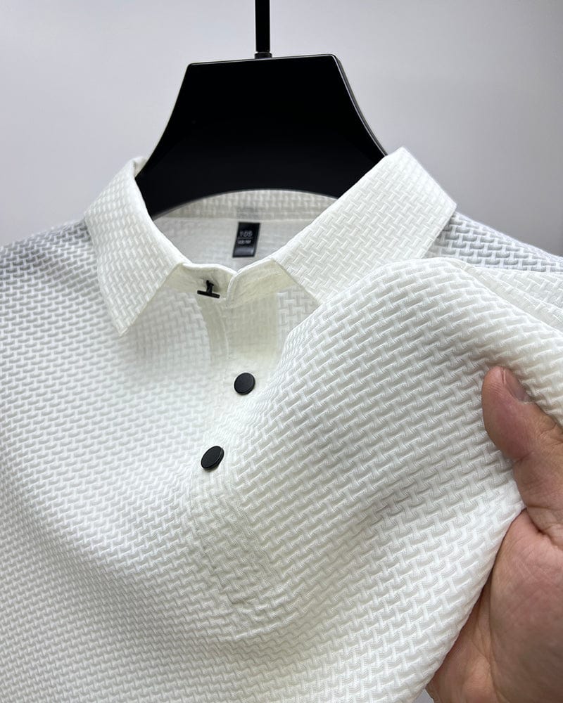 Men’s textured polo shirt with a button placket, short sleeves, and tailored fit, ideal for summer days, casual outings, and smart-casual wear.