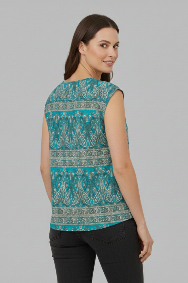 Women’s printed V-neck top with cap sleeves, loose fit, and floral pattern, suitable for casual wear and summer outfits.