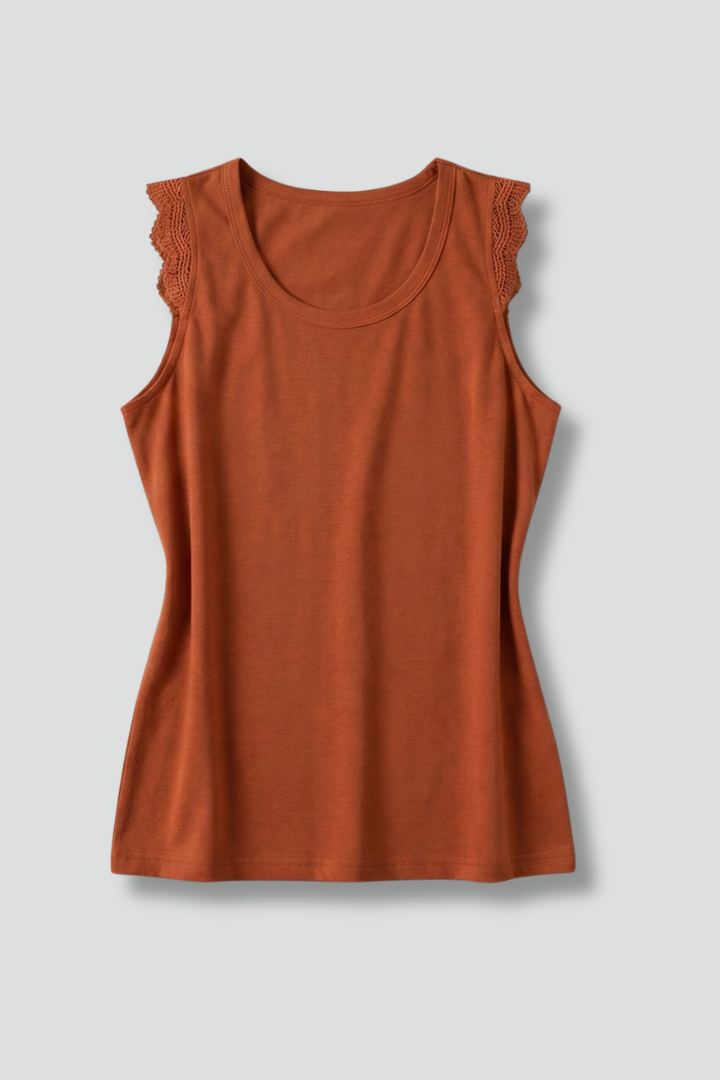 Women’s sleeveless top with round neckline and ruffle shoulders, ideal for casual wear and summer outfits.