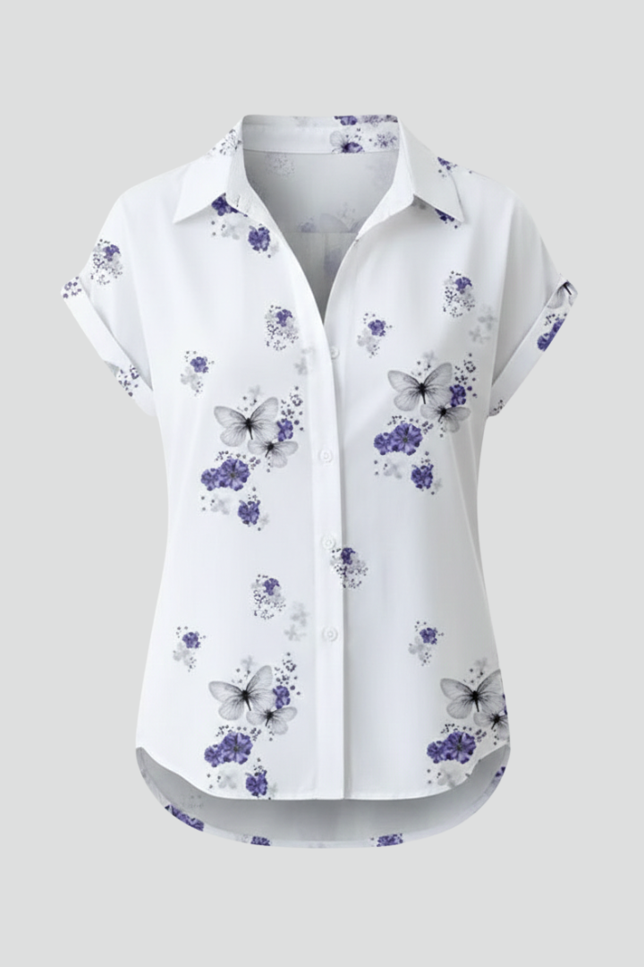 Women’s sleeveless top with V-neckline, button-front closure, loose fit, and printed design, suitable for summer wear and casual outfits.