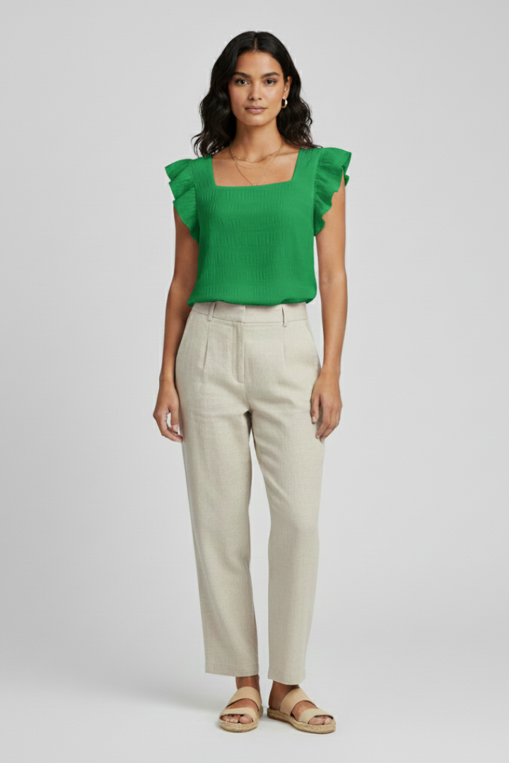 Women’s square neck blouse with short sleeves, loose fit, and textured woven surface, suitable for everyday wear and casual outfits.