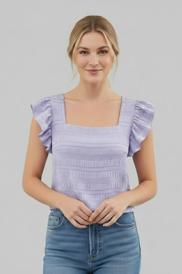 Women’s square neck blouse with flutter cap sleeves, relaxed fit, and textured surface, suitable for everyday wear and casual outfits.