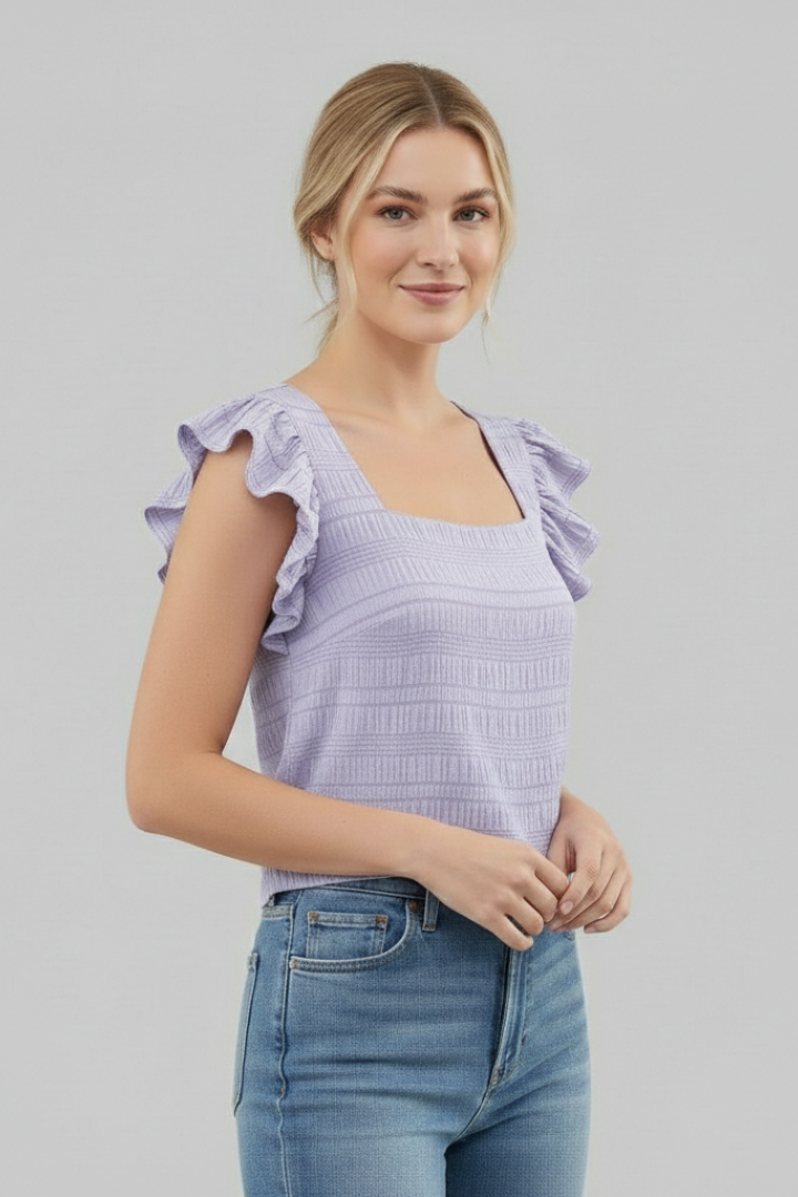 Women’s square neck blouse with flutter cap sleeves, relaxed fit, and textured surface, suitable for everyday wear and casual outfits.