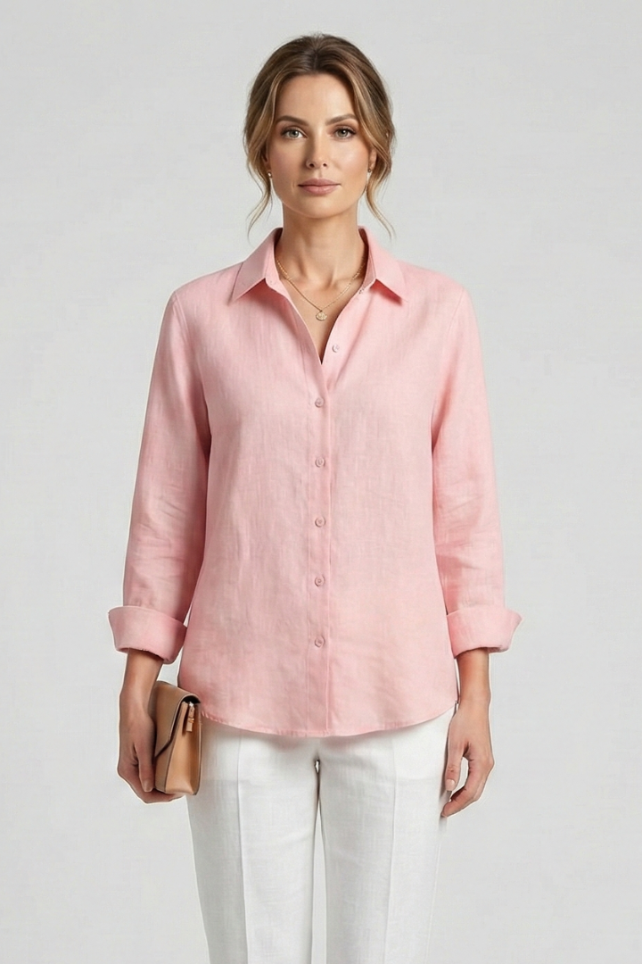 Women’s collared blouse with button fastening and roll-up sleeves, featuring a curved hem for everyday and work styling.