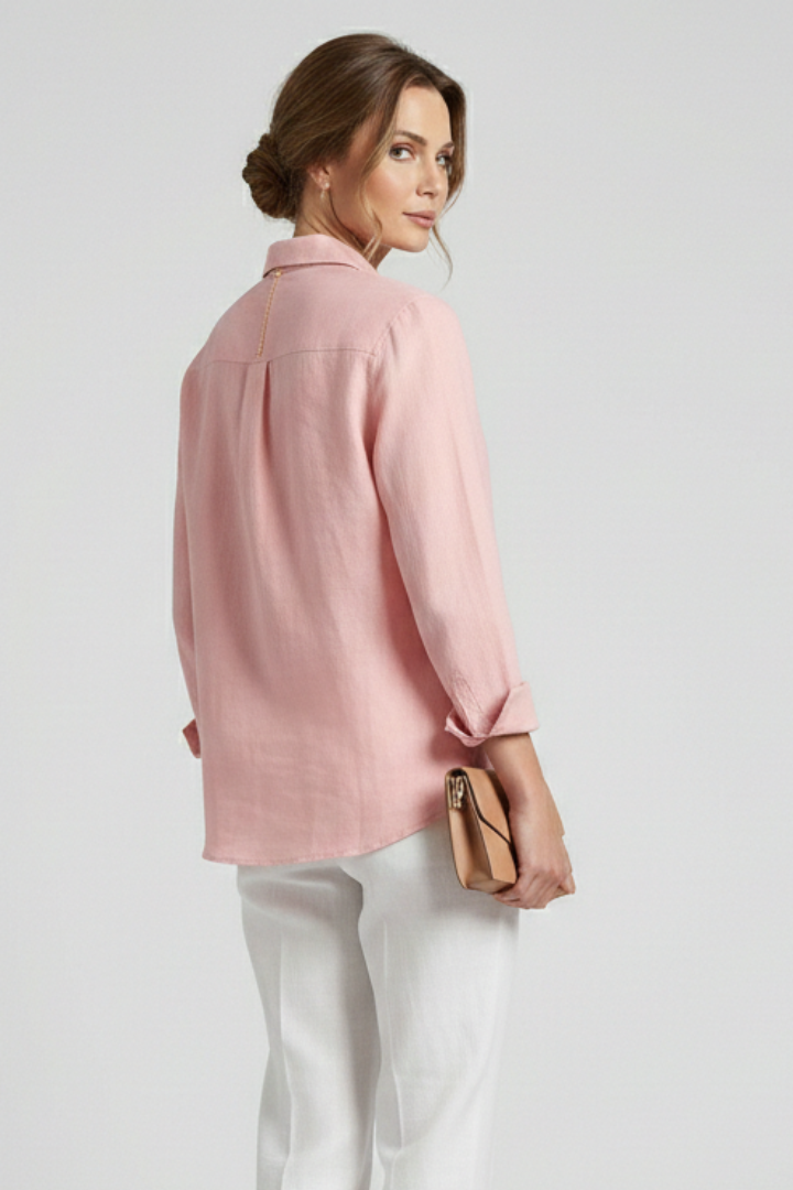 Women’s collared blouse with button fastening and roll-up sleeves, featuring a curved hem for everyday and work styling.