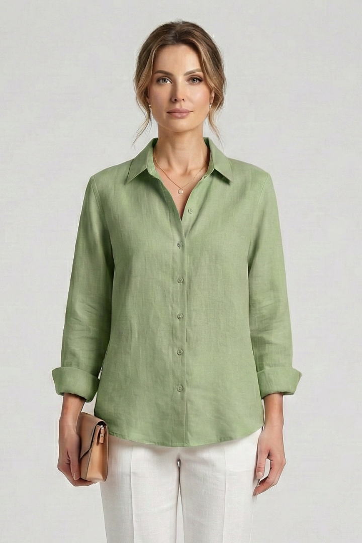 Women’s collared blouse with button fastening and roll-up sleeves, featuring a curved hem for everyday and work styling.