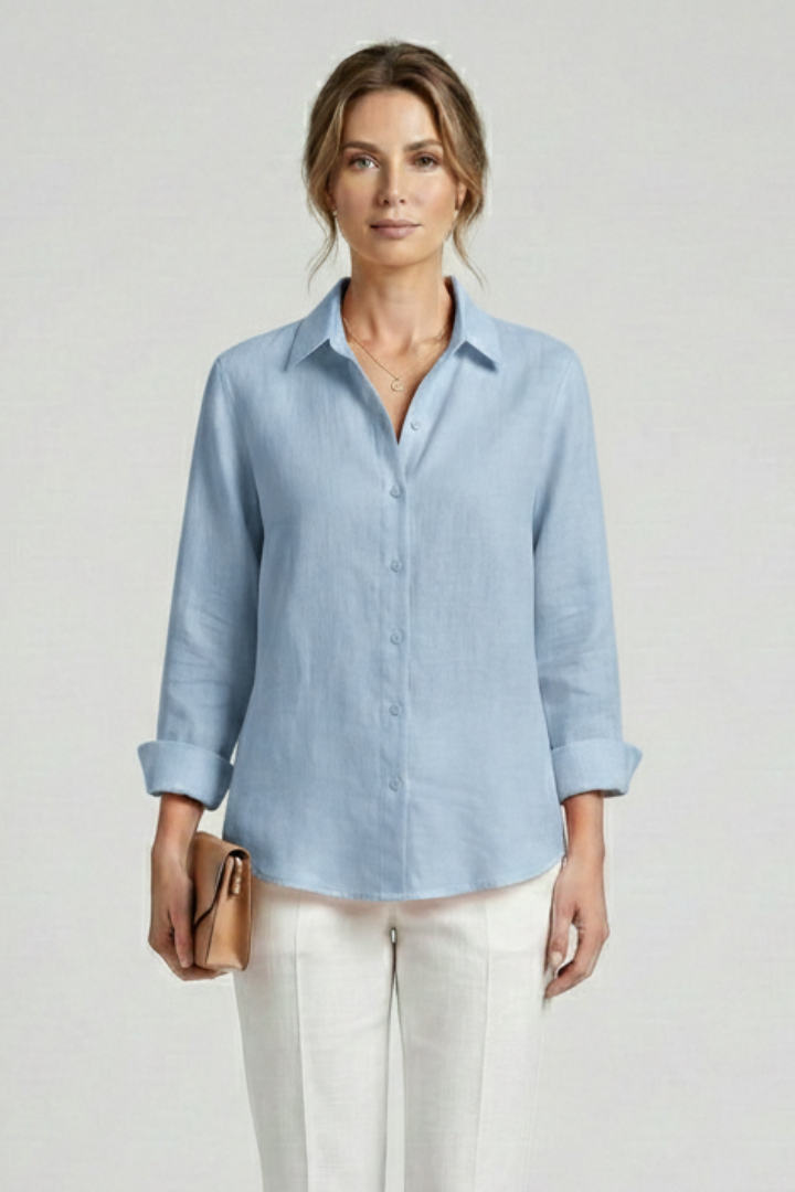 Women’s collared blouse with button fastening and roll-up sleeves, featuring a curved hem for everyday and work styling.