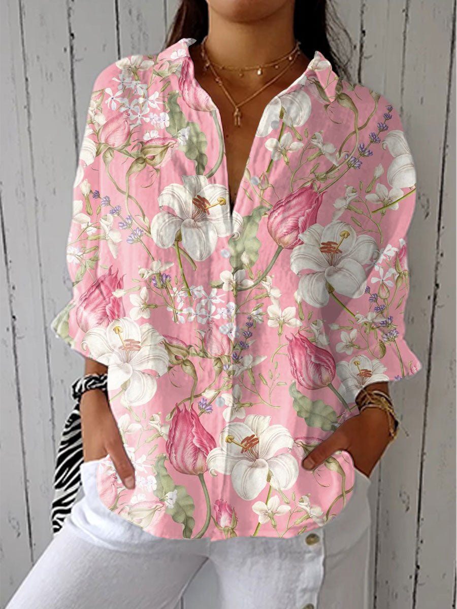 Women’s blouse with button-front closure, V-neckline, long sleeves, and relaxed fit, suitable for everyday wear and casual styling.