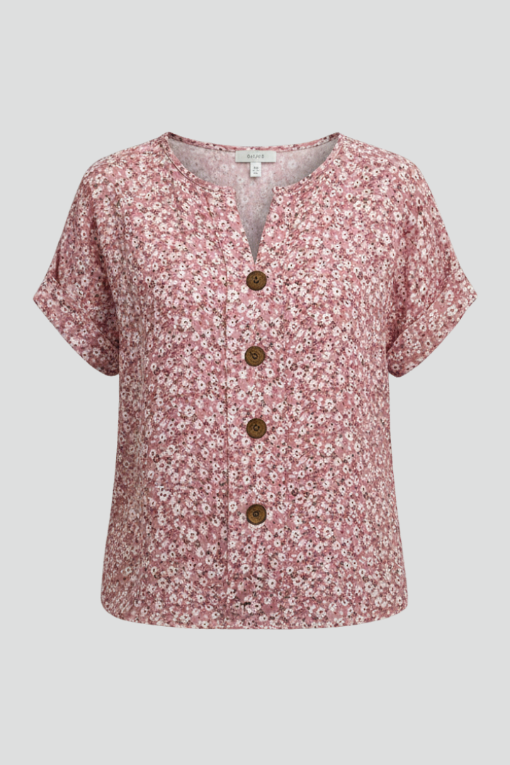 Women’s short sleeve blouse with round neckline, button front, printed surface, and straight hem for casual everyday styling.