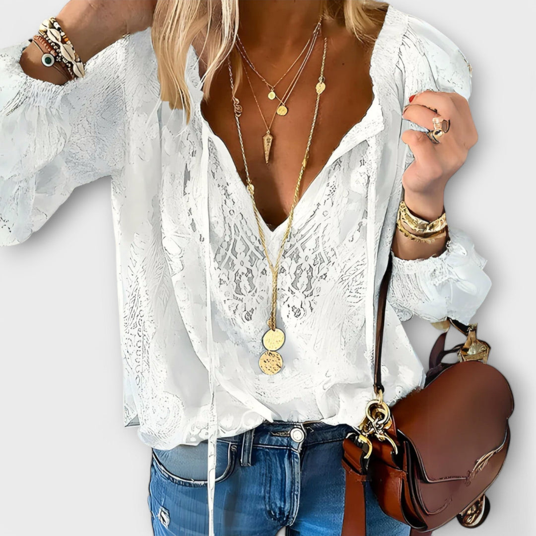 Women’s boho top with a V-neckline, long sleeves, and relaxed fit, perfect for casual summer outfits, vacations, and everyday wear.
