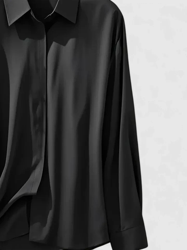 Women’s button front top with a collared neckline, curved hem, and relaxed fit, ideal for office wear and smart-casual outfits.