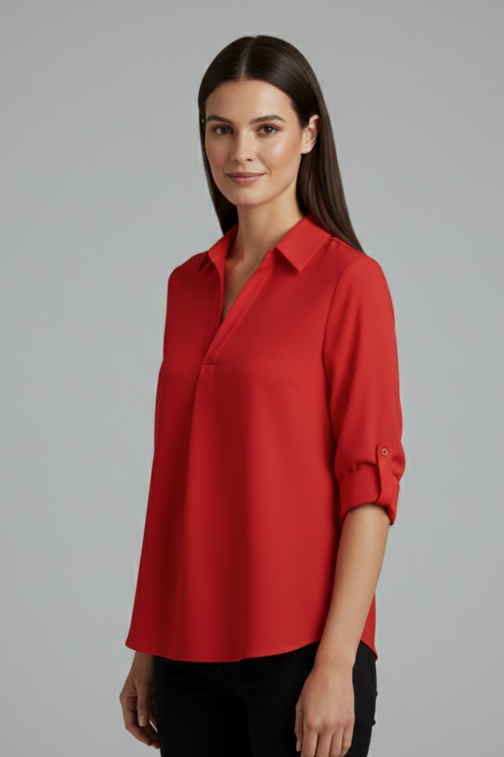Women’s button-up blouse with collared neckline, long sleeves, and chest pocket, suitable for office wear and everyday styling.