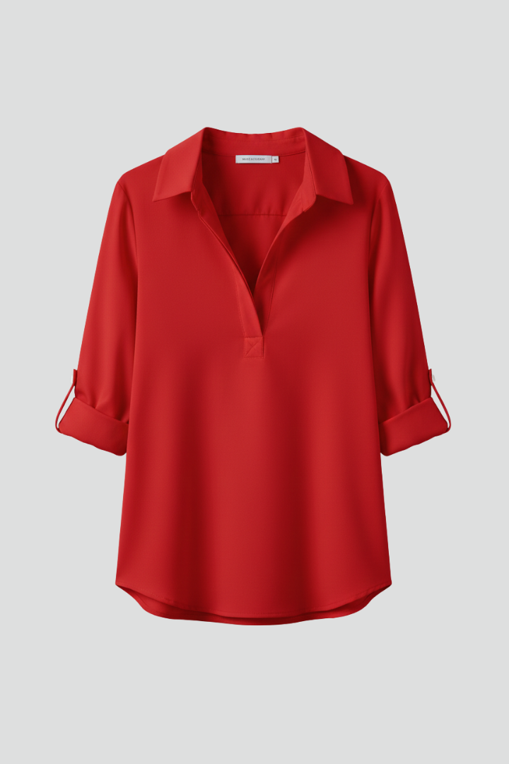 Women’s button-up blouse with collared neckline, long sleeves, and chest pocket, suitable for office wear and everyday styling.