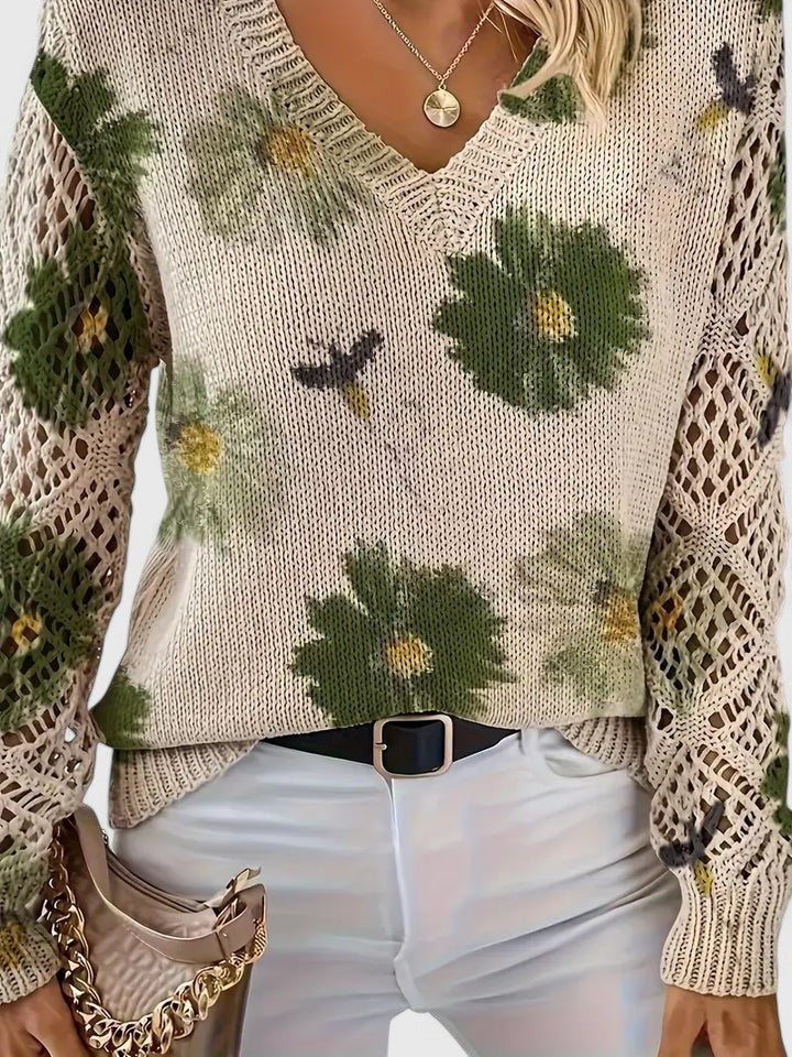 Women’s cardigan with a floral pattern, V-neckline, and open-weave sleeves, ideal for casual outings, office wear, and layered styling.