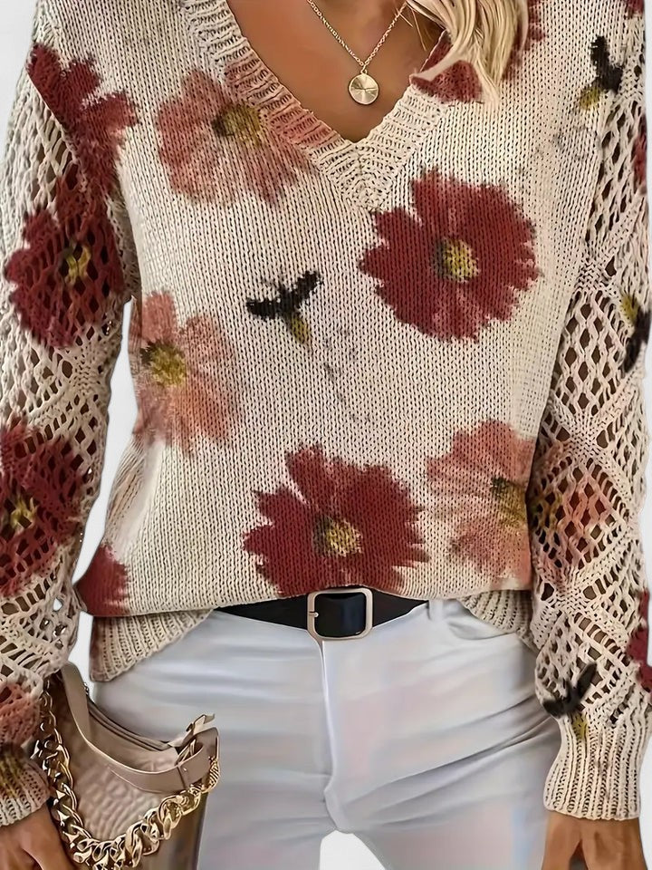 Women’s cardigan with a floral pattern, V-neckline, and open-weave sleeves, ideal for casual outings, office wear, and layered styling.