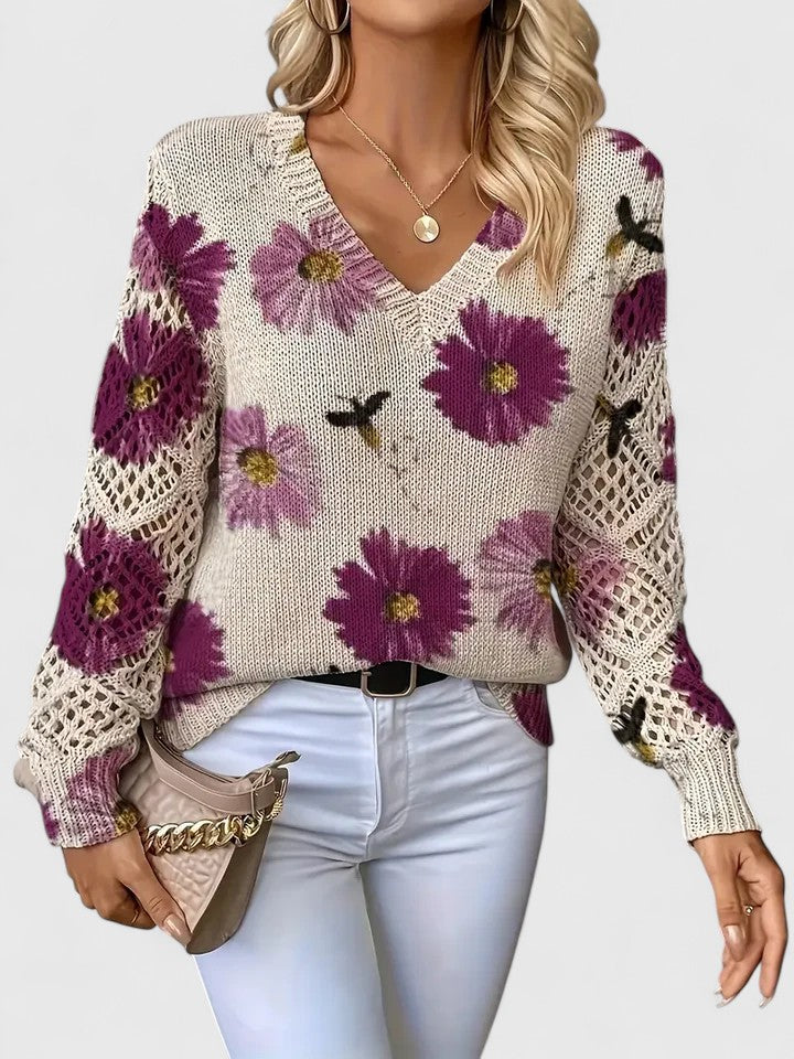 Women’s cardigan with a floral pattern, V-neckline, and open-weave sleeves, ideal for casual outings, office wear, and layered styling.