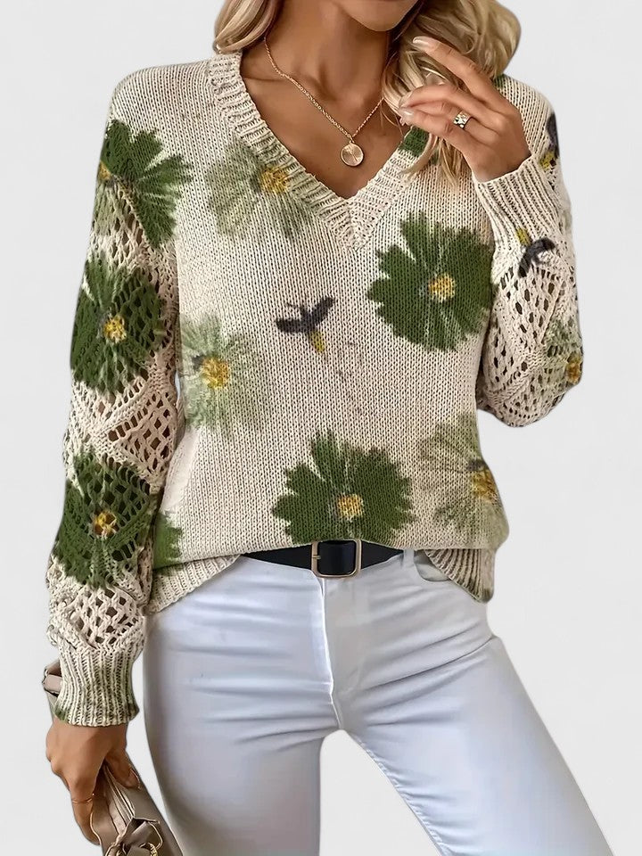 Women’s cardigan with a floral pattern, V-neckline, and open-weave sleeves, ideal for casual outings, office wear, and layered styling.