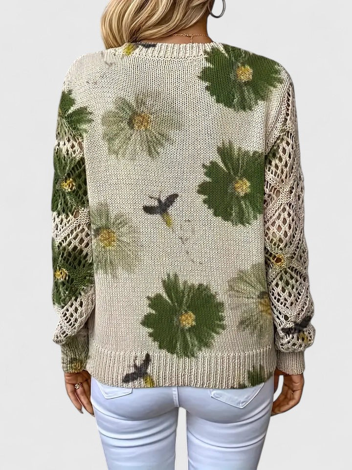 Women’s cardigan with a floral pattern, V-neckline, and open-weave sleeves, ideal for casual outings, office wear, and layered styling.
