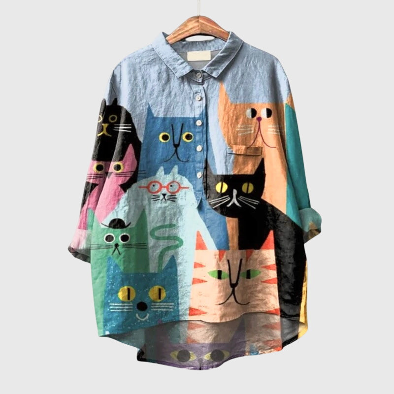 Women’s cat print blouse with a relaxed fit and playful design, perfect for casual wear, daily outfits, and comfortable styling.