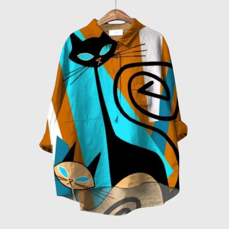 Women’s cat print blouse with a relaxed fit and playful design, perfect for casual wear, daily outfits, and comfortable styling.