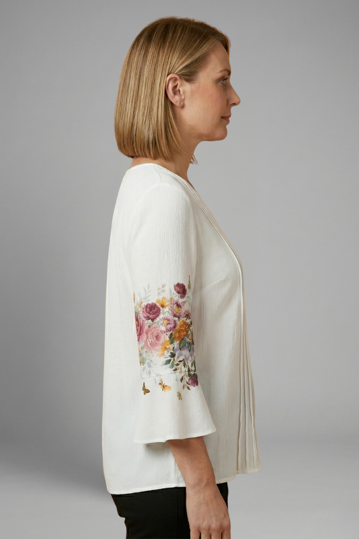 Women’s cotton blend top with round neckline, short sleeves, smooth woven surface, and straight hem for everyday styling.