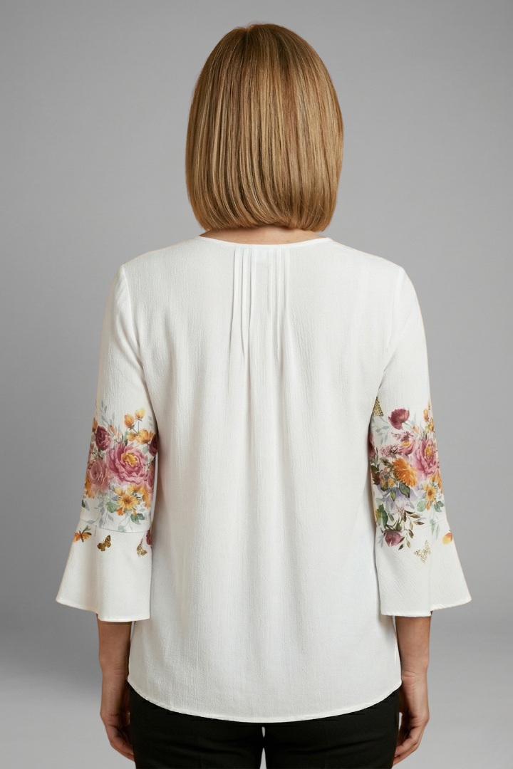 Women’s cotton blend top with round neckline, short sleeves, smooth woven surface, and straight hem for everyday styling.