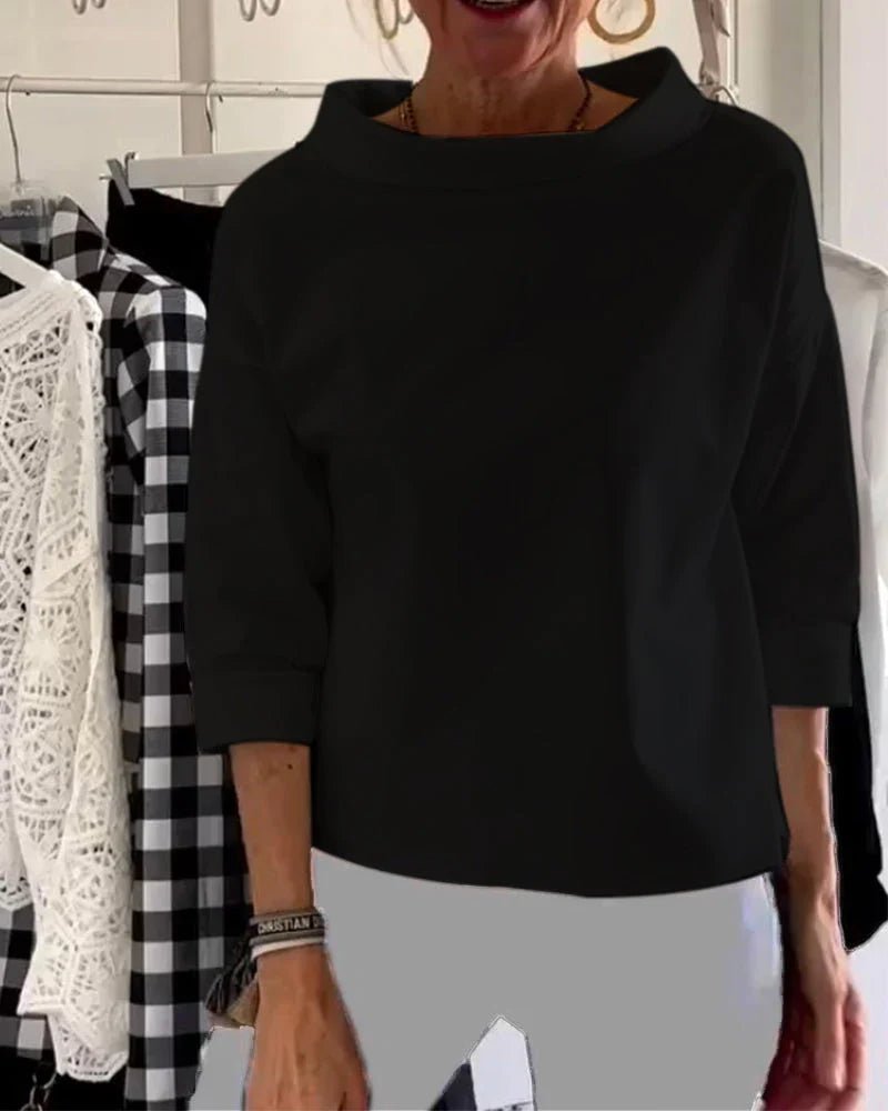 Women’s top with cowl neck, 3/4 sleeves, and relaxed fit, suitable for office outfits, casual evenings, and everyday styling.