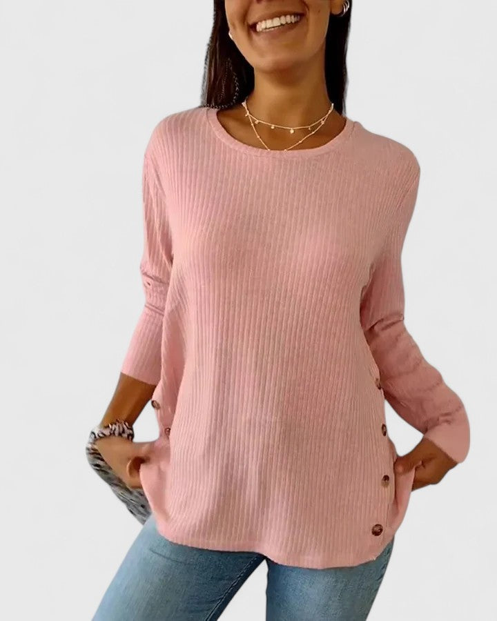 Women’s crew neck top featuring a relaxed fit and classic neckline, ideal for everyday wear, casual outfits, and versatile styling.