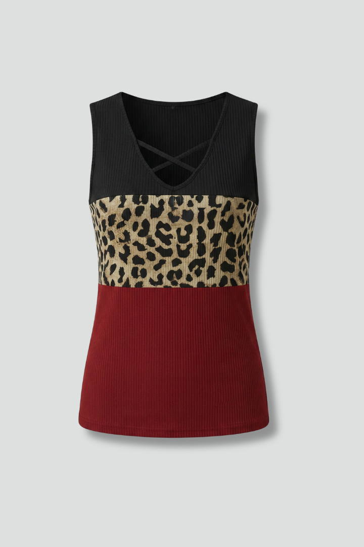 Women’s sleeveless top with criss-cross v-neckline and printed panel, suitable for casual wear and summer outfits