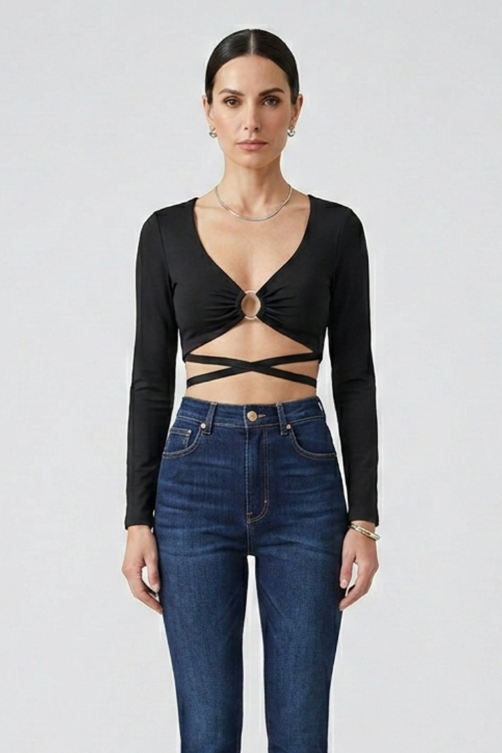 Women’s crop top with deep v-neckline, front ring detail, and wrap straps, ideal for party outfits and casual evening styling.