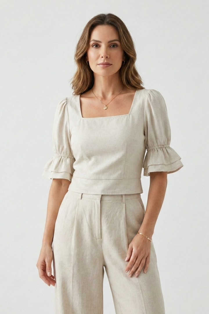 Women’s crop top with square neckline and short puff sleeves, ideal for casual summer outfits and everyday fashion styling.