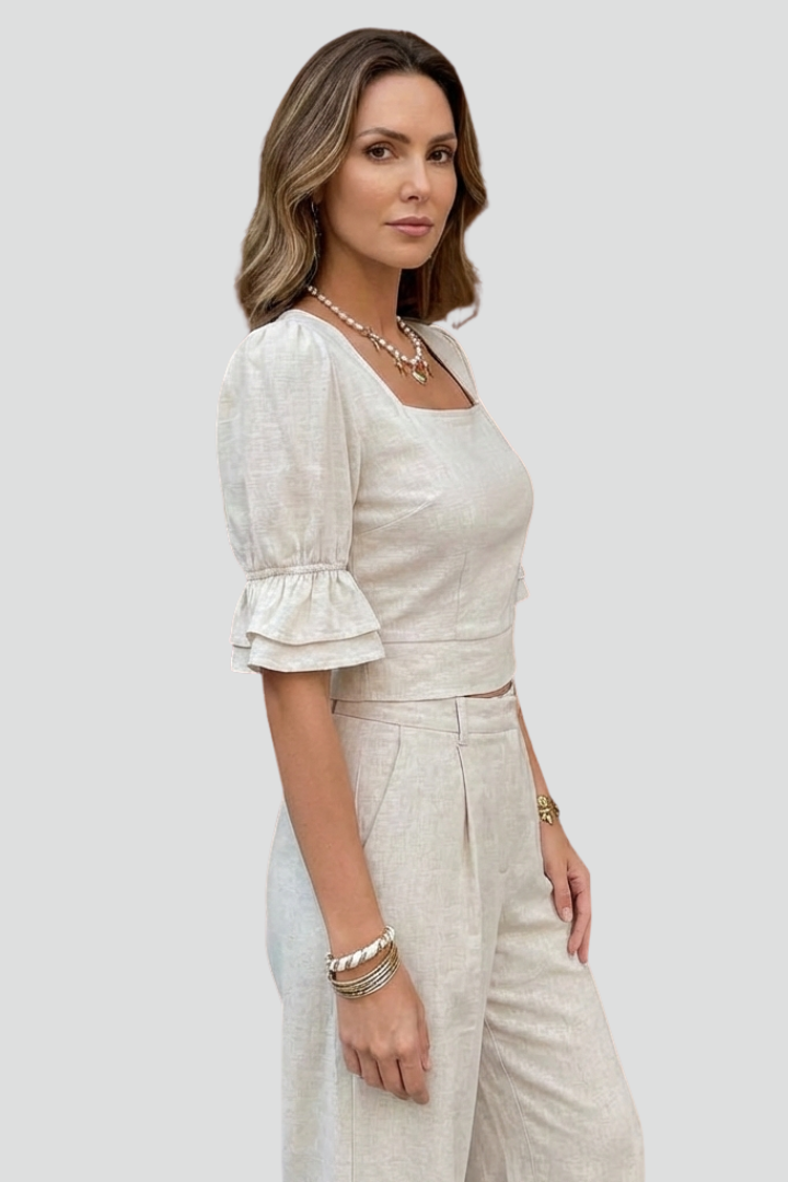 Women’s crop top with square neckline and short puff sleeves, ideal for casual summer outfits and everyday fashion styling.