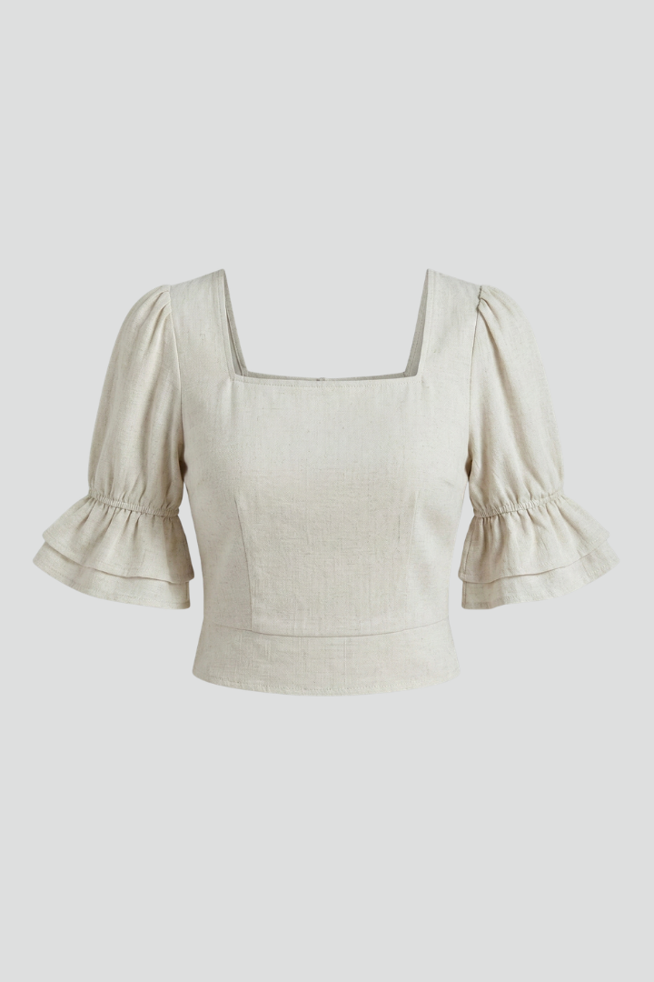 Women’s crop top with square neckline and short puff sleeves, ideal for casual summer outfits and everyday fashion styling.