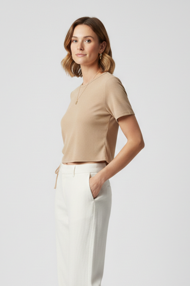 Women’s cropped T-shirt with side ruching and adjustable tie detail, designed for casual wear and modern styling.