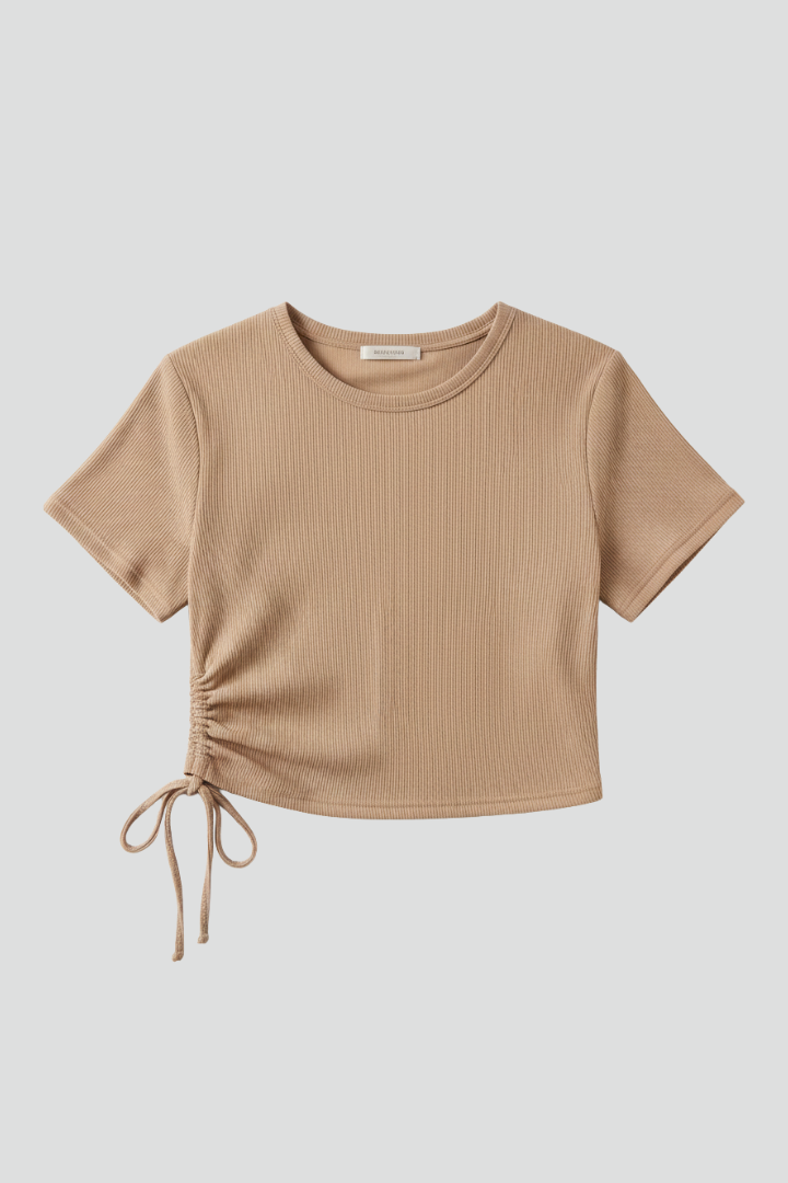 Women’s cropped T-shirt with side ruching and adjustable tie detail, designed for casual wear and modern styling.