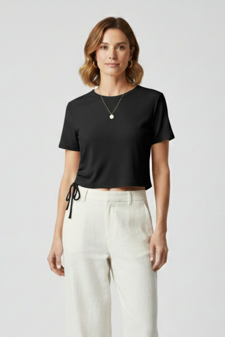 Women’s cropped T-shirt with side ruching and adjustable tie detail, designed for casual wear and modern styling.