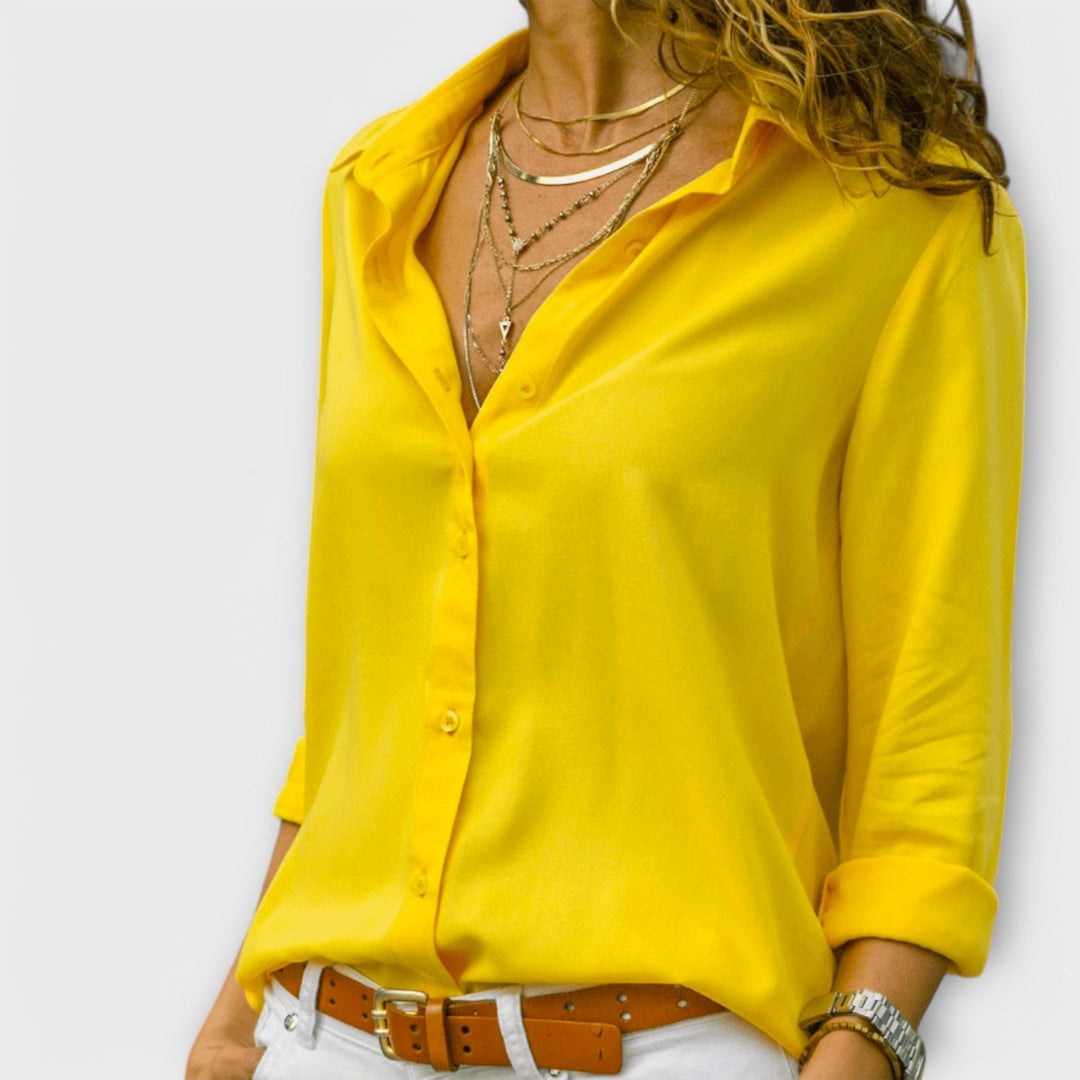 Women’s elegant blouse with refined fit and timeless silhouette, ideal for office wear, dinners, and casual everyday styling.