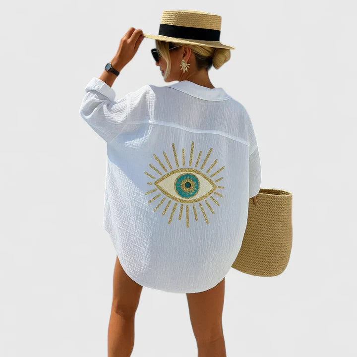 Women’s elegant blouse with embroidered back detailing and a relaxed fit, suitable for summer outfits, casual wear, and vacation styling.