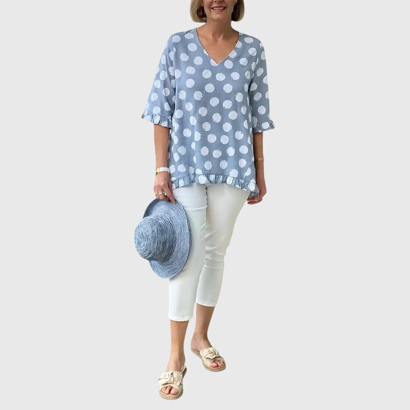 Women’s elegant blouse with a flattering fit and timeless silhouette, suitable for office outfits, casual wear, and smart occasions.