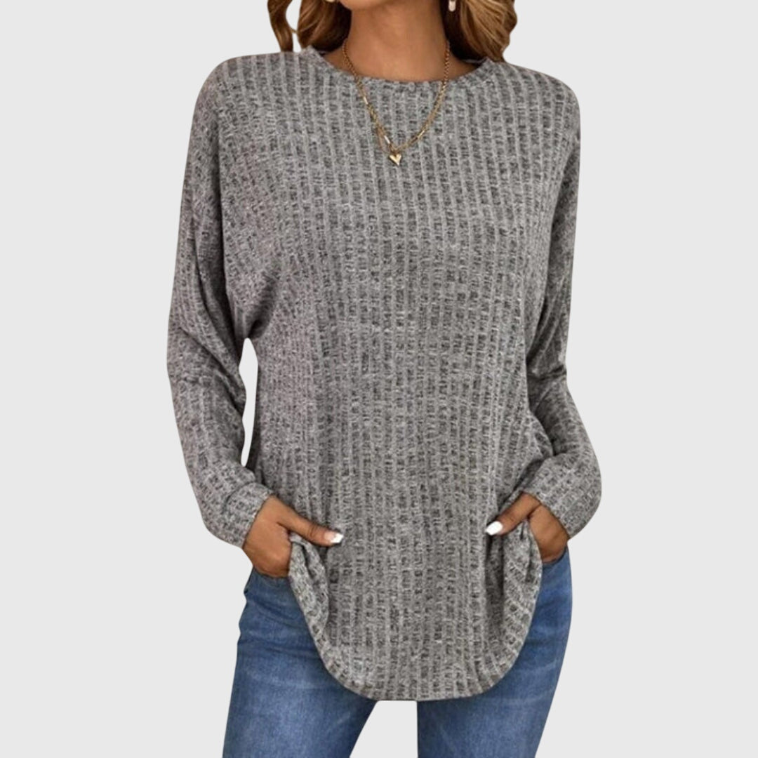 Women’s elegant top with a relaxed fit and flowy silhouette, ideal for office wear, casual outings, and smart-casual styling.