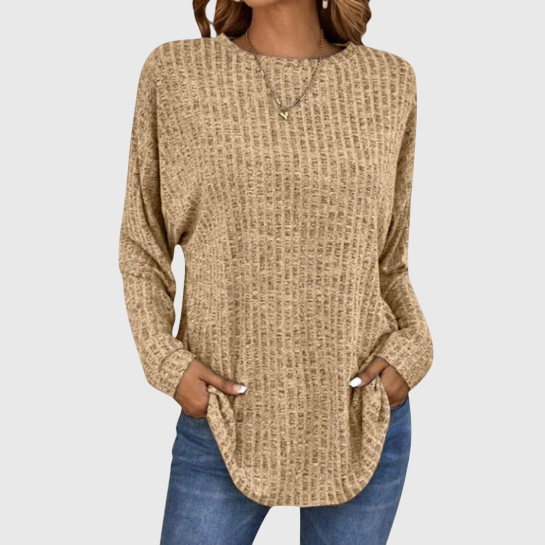 Women’s elegant top with a relaxed fit and flowy silhouette, ideal for office wear, casual outings, and smart-casual styling.