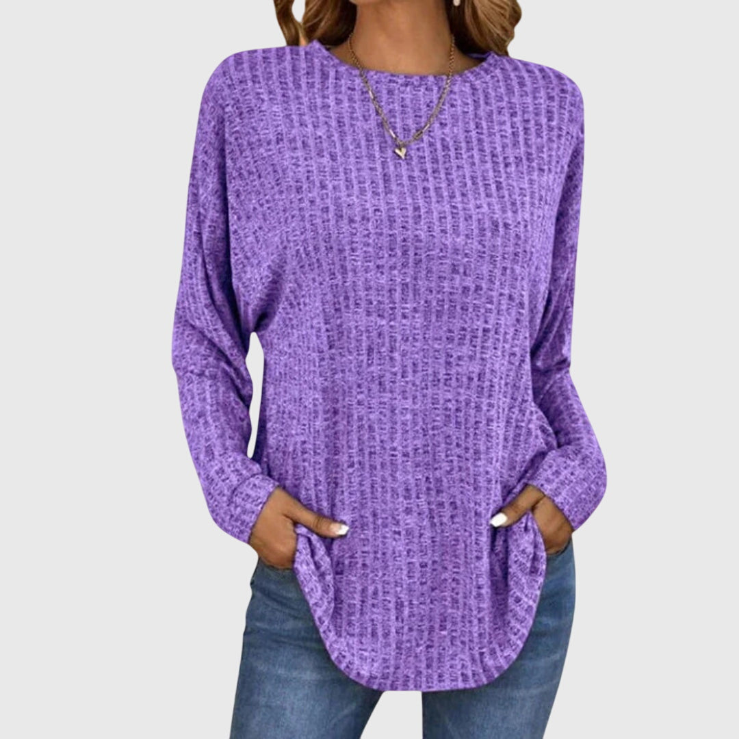 Women’s elegant top with a relaxed fit and flowy silhouette, ideal for office wear, casual outings, and smart-casual styling.