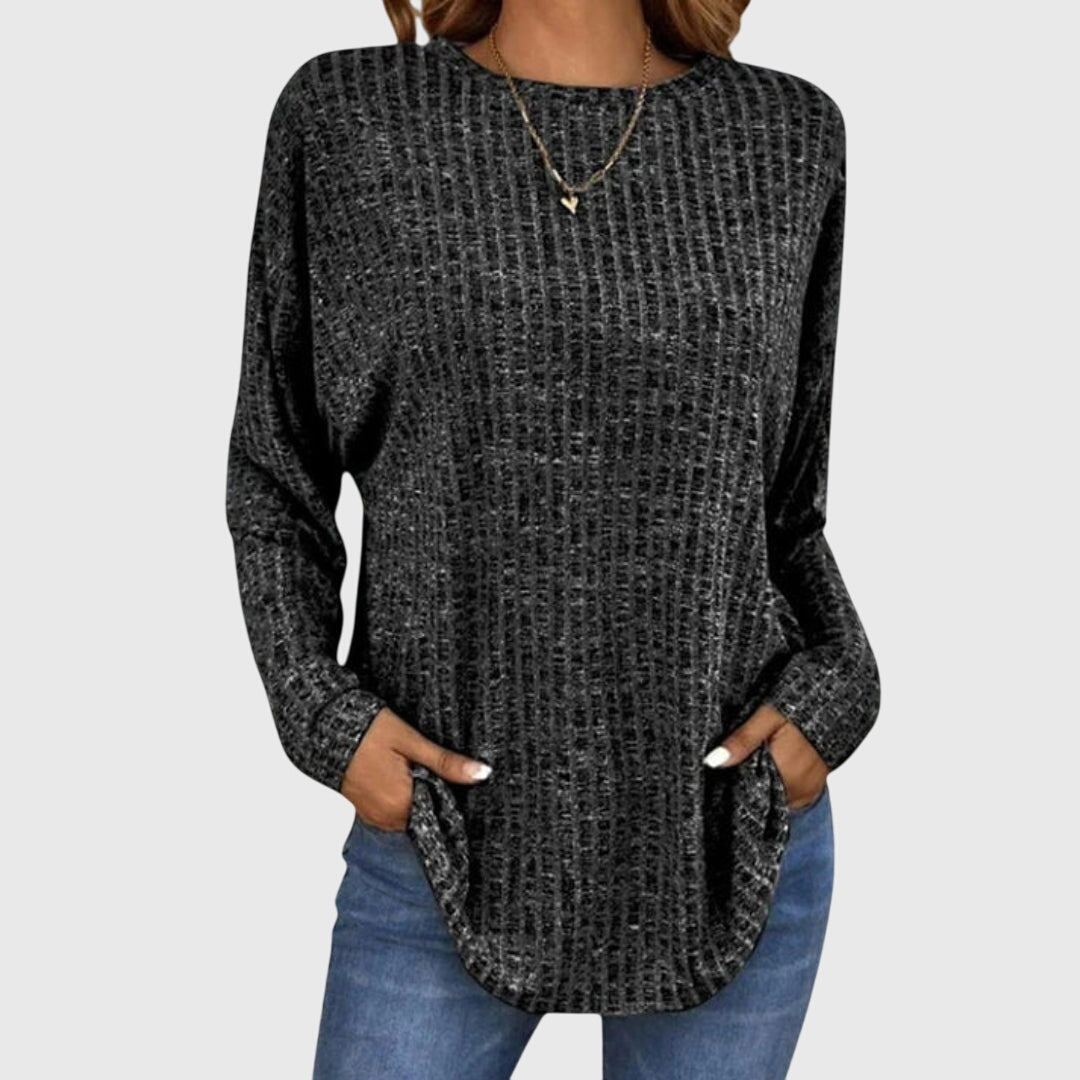 Women’s elegant top with a relaxed fit and flowy silhouette, ideal for office wear, casual outings, and smart-casual styling.