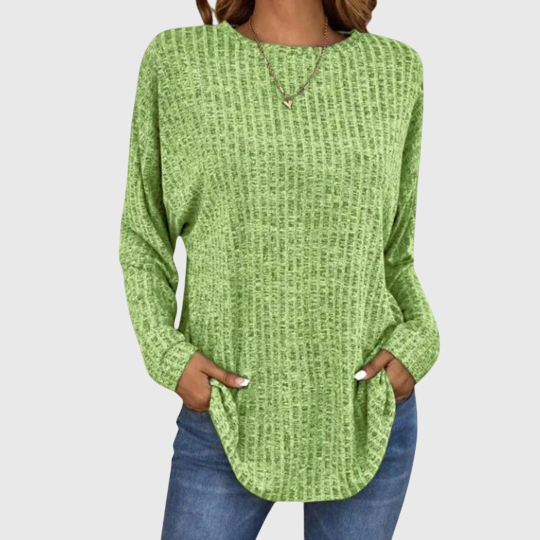 Women’s elegant top with a relaxed fit and flowy silhouette, ideal for office wear, casual outings, and smart-casual styling.