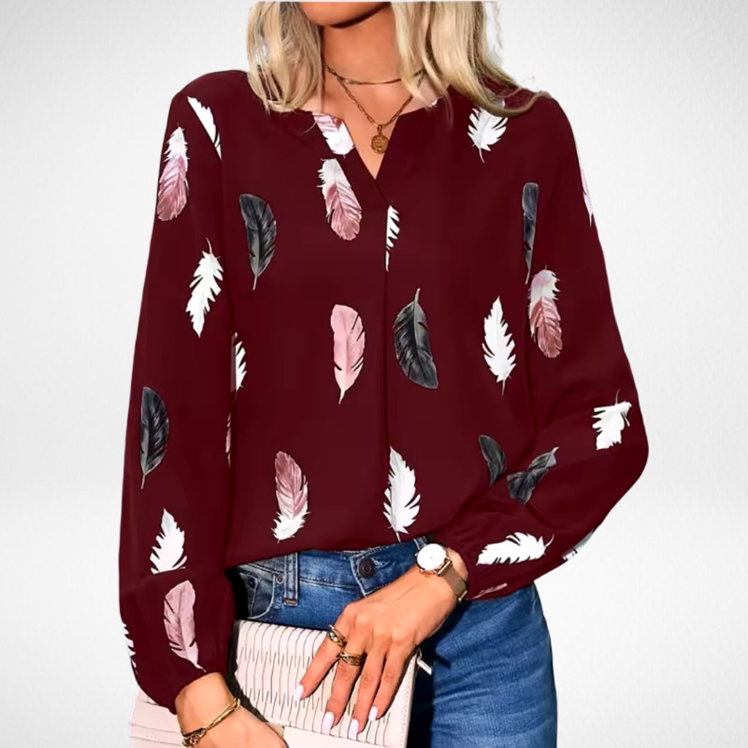 Women’s fit blouse with a timeless silhouette and elegant design, suitable for office outfits, casual wear, and smart occasions.