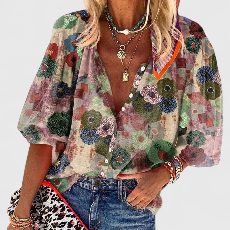 Women’s floral blouse with button placket and relaxed fit, ideal for office wear, dinners, and casual everyday styling.