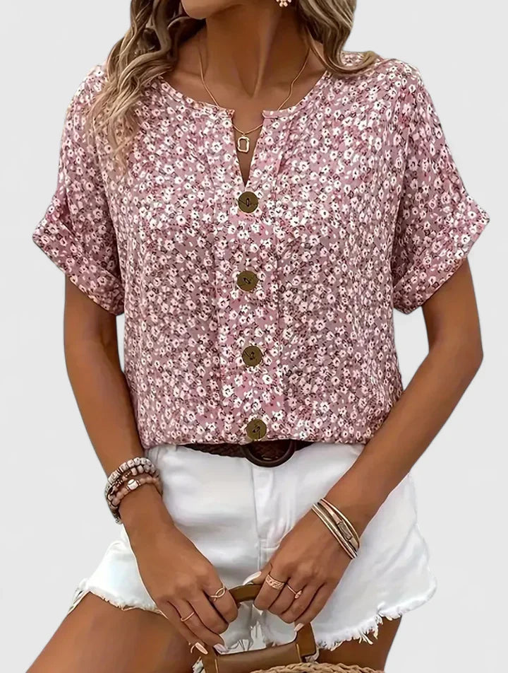 Women’s floral blouse with button-up front and relaxed fit, ideal for office wear, vacations, and casual everyday styling.