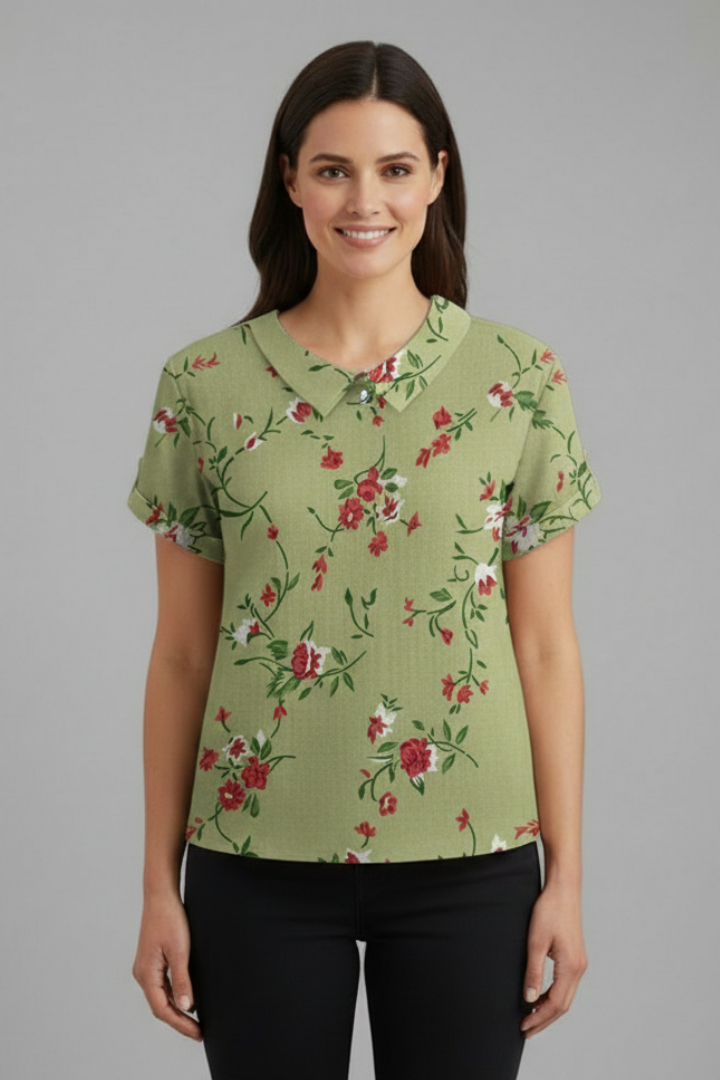 Women’s short sleeve blouse with collared neckline and floral print, featuring a relaxed fit and textured surface for everyday and office wear.